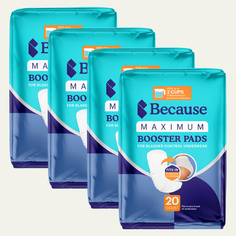 Four packages of Because Maximum Booster Pads on a white background