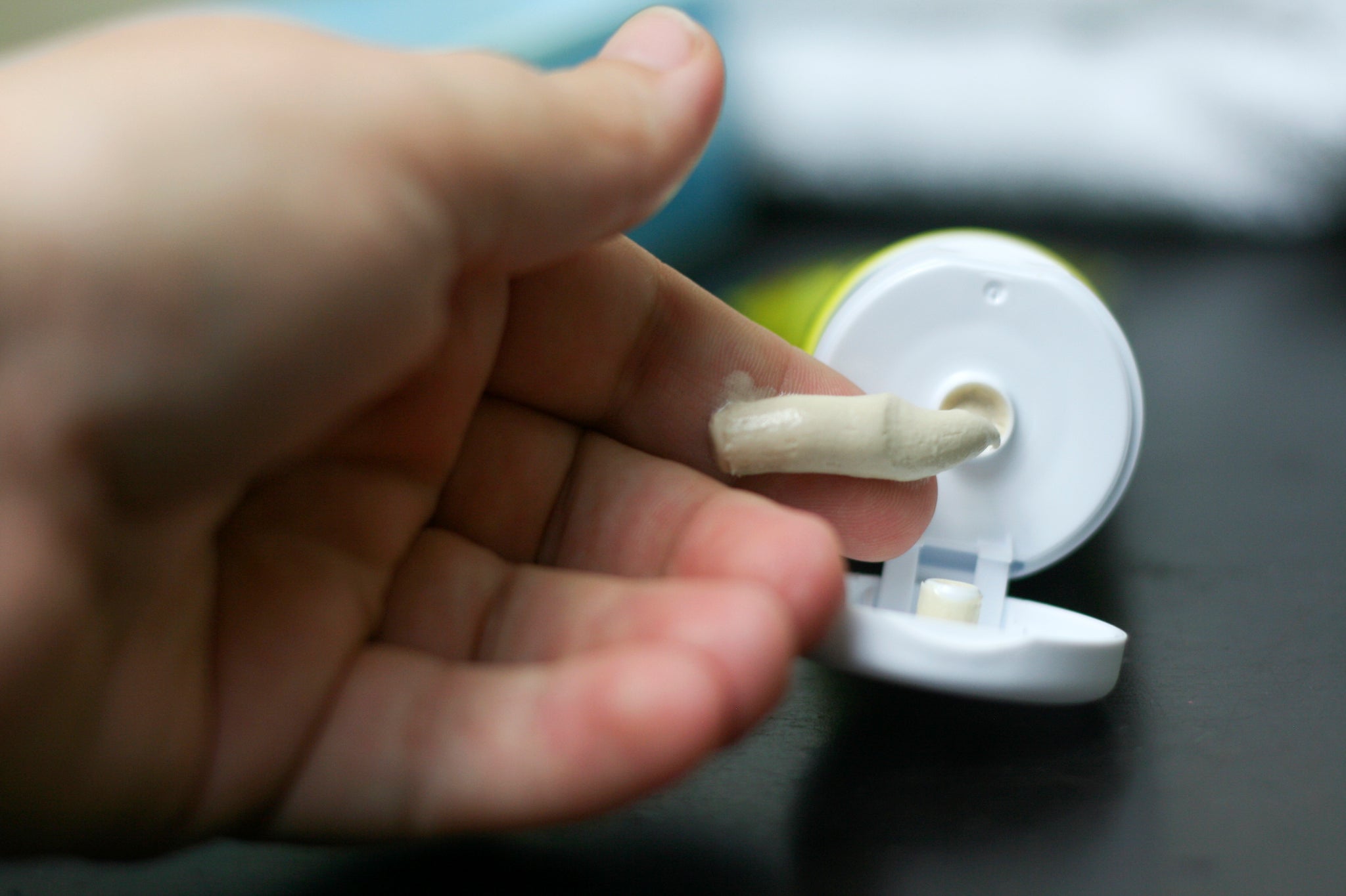 Hand dispensing cream from a tube for treatment