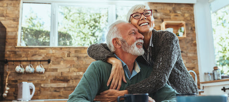 Shot of a mature woman hugging her husband