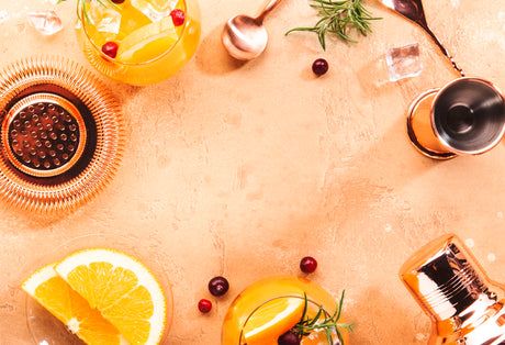 Festive cocktails and garnishes on a table