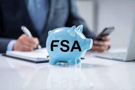 A piggy bank with 'FSA" on it.