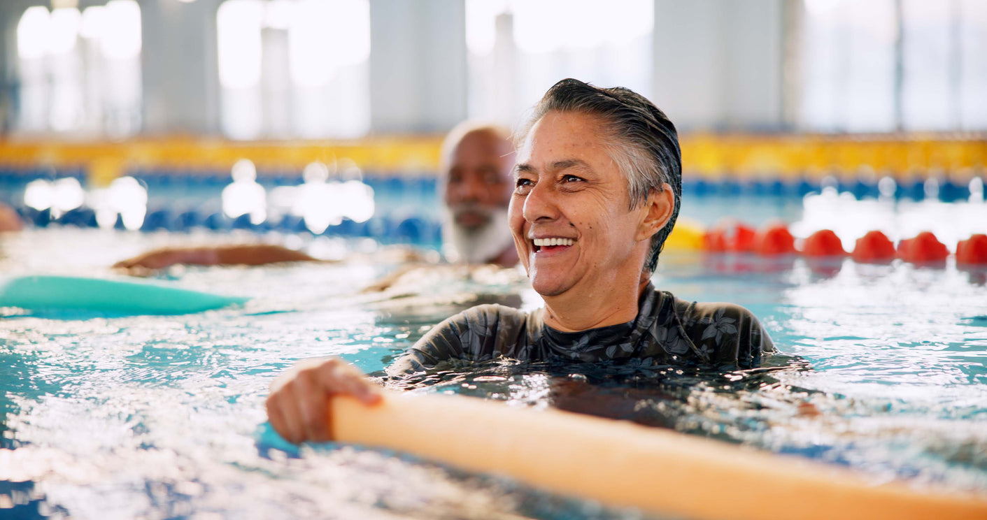 A person in a pool fitness class.