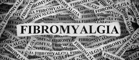 The word "Fibromyalgia" is present in the image in strips of newspaper type covering the image.