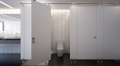 A toilet in an open stall.