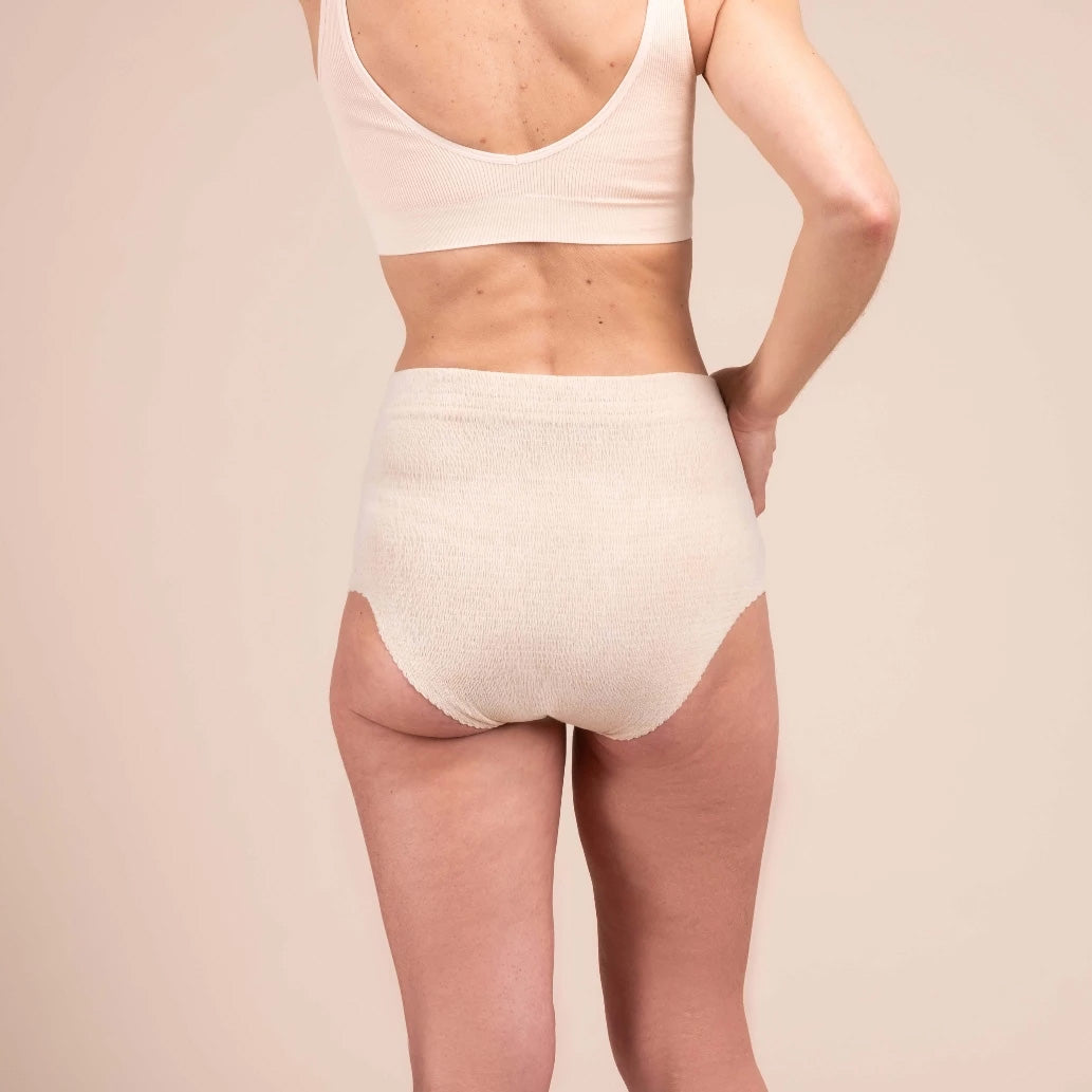 Woman wearing a beige underwear