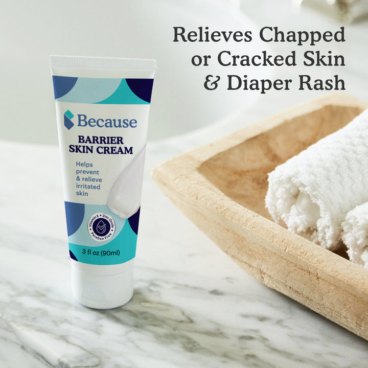 Bottle of Because Barrier Skin Cream on marble surface with text "relieves chapped or cracked skin & diaper rash."