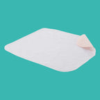 Because Reusable Underpad Heavy Absorbency with teal background.