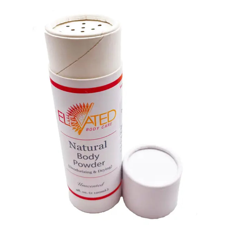 Can of Elevated Body Care natural body powder with lid removed on a white background