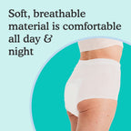 Woman wearing white overnight underwear that looks absorbent and sleek