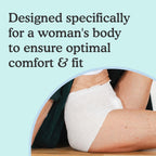 Side view of a woman wearing Overnight underwear with text "designed specifically for a woman's body to ensure optimal comfort and fit" on light blue background