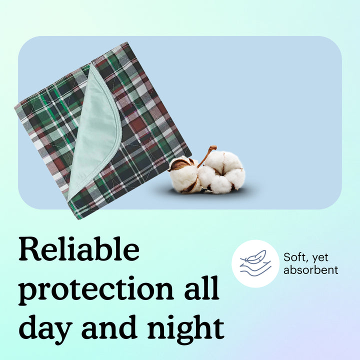 Reusable bed pad in plaid with text "Reliable protection all day and night. It's soft, yet absorbent." on light blue background