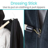 A dressing stick to assist in dressing.