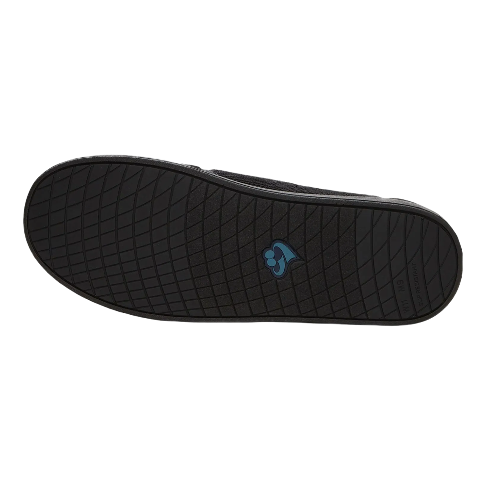Silvert's extra wide slip resistant slippers in black viewed from the bottom to show the sole.
