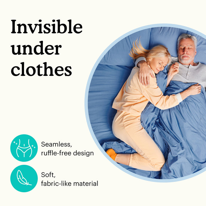 Couple sleeping under a blue blanket with text about invisible under clothes.