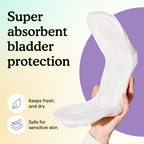 A hand holding one long Overnight pad, curved to show its soft top layer, next to icons for keeps fresh and dry and safe for sensitive skin.