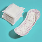 Because overnight pad opened because a stack of pads on teal background. 