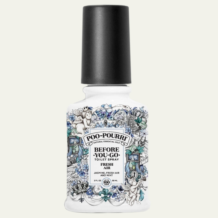 Poo-Pourri bottle with decorative label on a white background