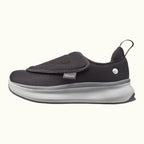 Side view of Black Women's Extra Wide Comfort Shoes with gray and white soles on a white background