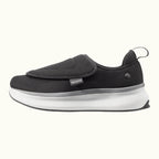 Side view of Black Men's Extra Wide Comfort Shoes with gray and white soles on a white background