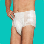 Front view of man wearing Because Maximum tabbed briefs on teal background