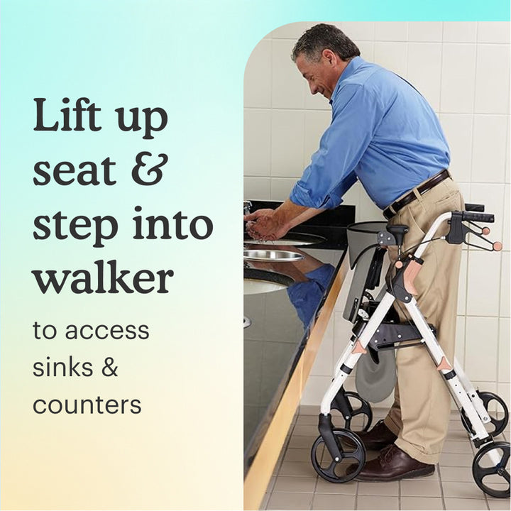 Man using White Aluminum Premium Folding Rollator Walker to access a sink in a bathroom with text "lift up seat and step into walker to access sinks and counters" on light yellow background