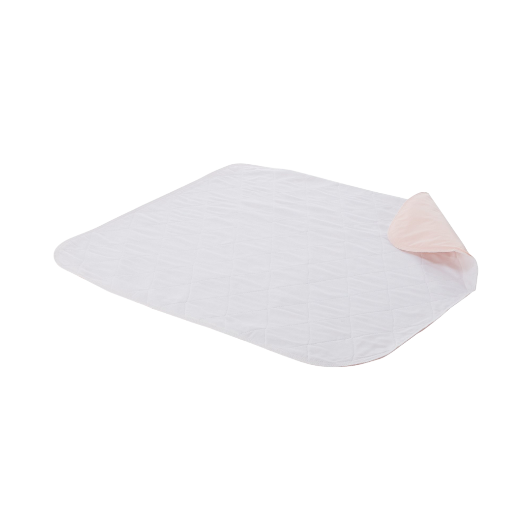 A flat reusable bed pad
