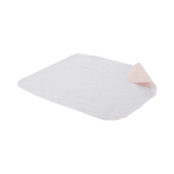 A flat reusable bed pad