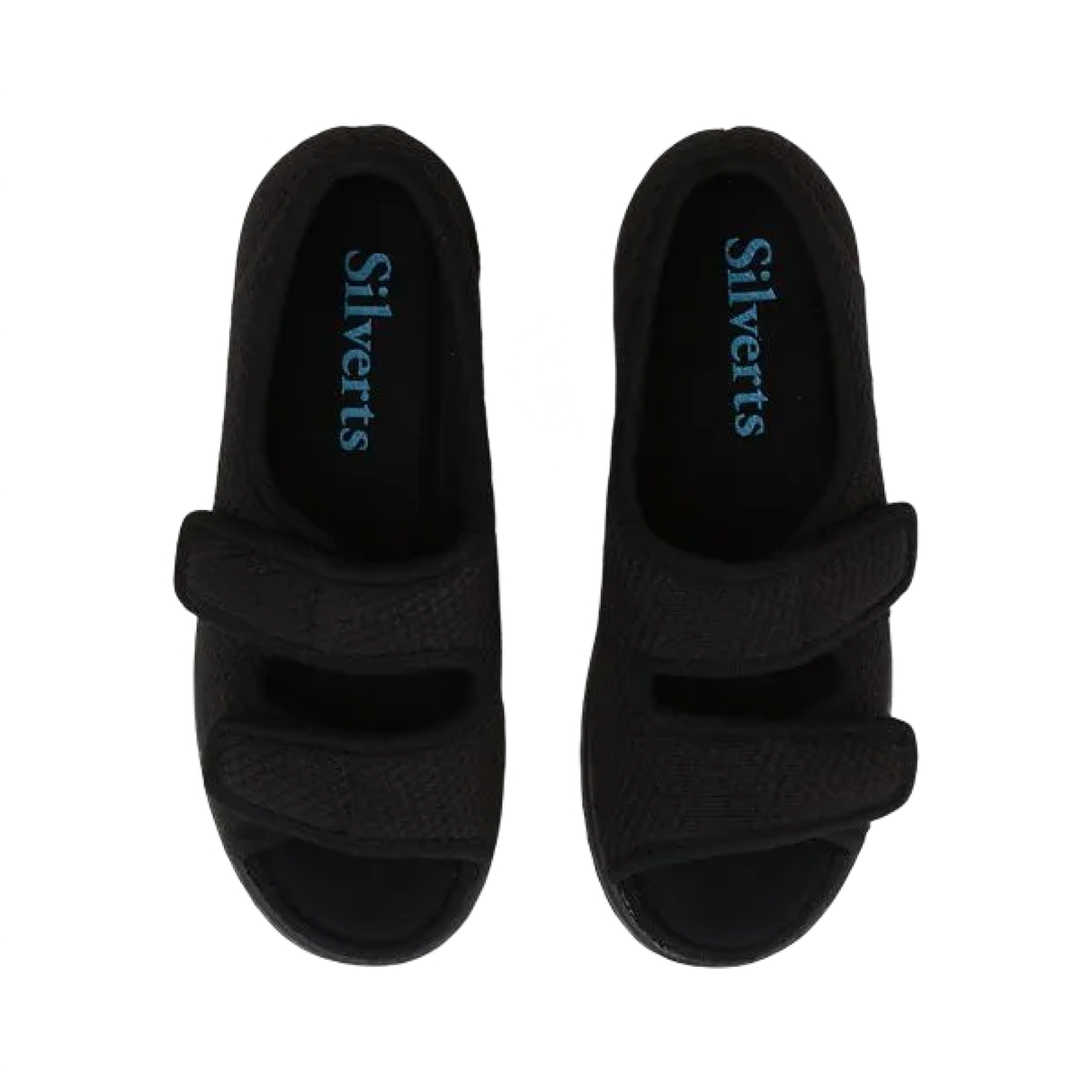 Top down view of black velvet open toed sandals