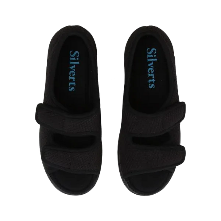 Top down view of black velvet open toed sandals