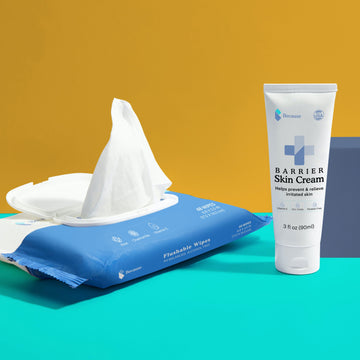 Flushable wipes next to barrier skin cream