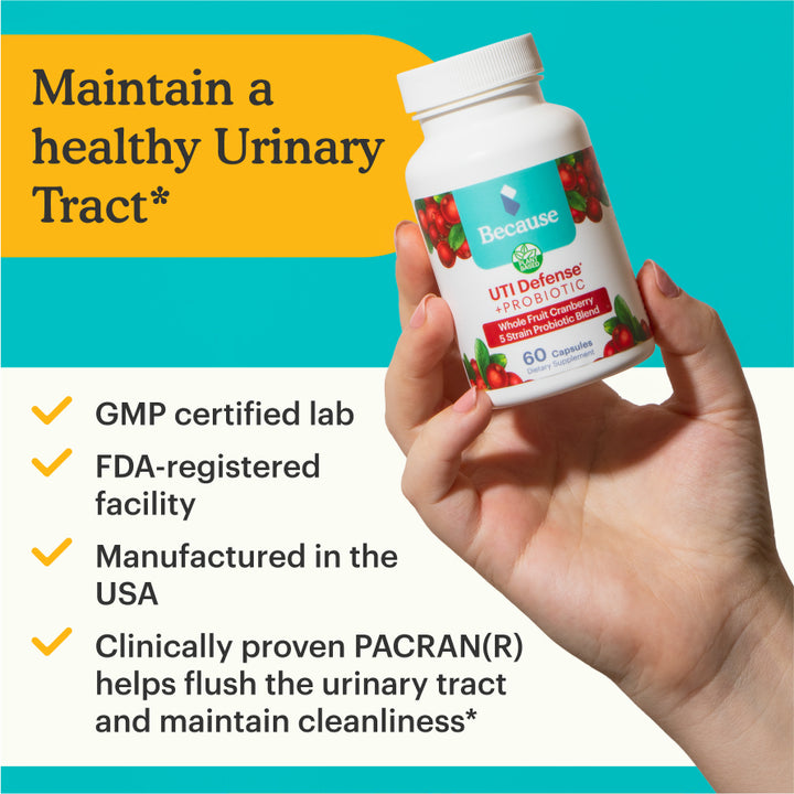Hand holding bottle of Because UTI supplement with text "maintain a healthy urinary tract" on white and blue background