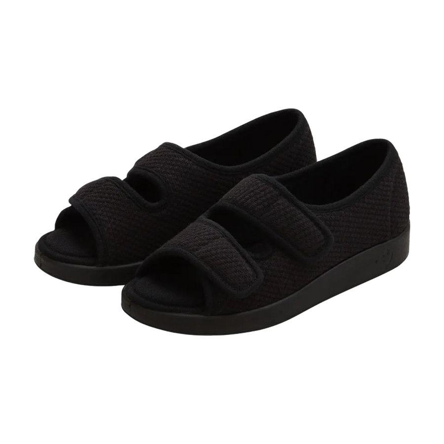 Side view of black velvet open toed sandals
