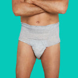 Man wearing a pair of gray absorbent underwear