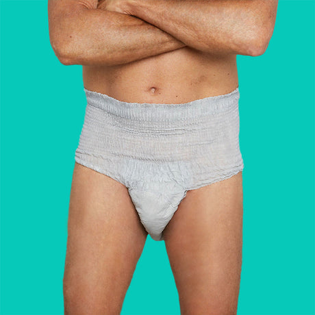 Man wearing a pair of gray absorbent underwear