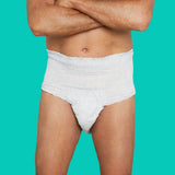 Man wearing white overnight absorbent underwear