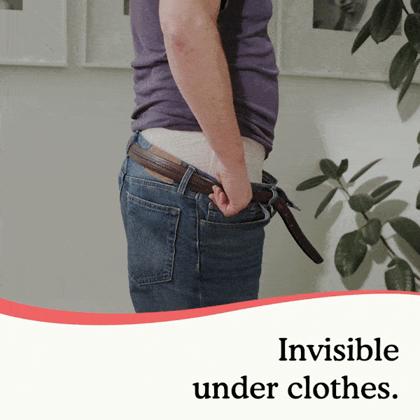 Man pulling up jeans over mens premium maximum underwear to show that it is not visible under clothes