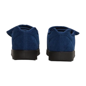 Back of navy blue slippers with black soles