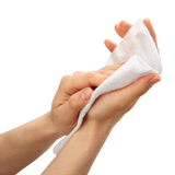 Two hands holding a soft looking barrier cream wipe